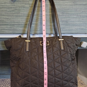 Black large quilted purse by Kate Spade in excellent condition!
