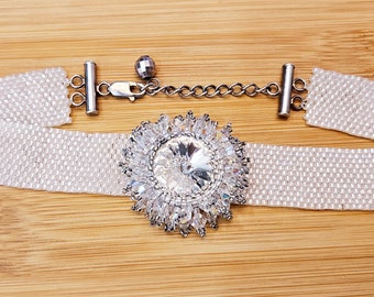 Handcrafted white choker made with Japanese seed beads and swarovski crystals in excellent vintage condition!