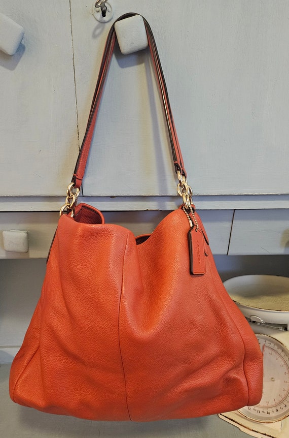 Vintage Phoebe Coach purse in Coral. This large be