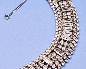 Stunning old Hollywood style rhinestone bracelet with a safety chain by Joseph Weisner.