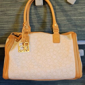 Vintage Calvin Klein logo tote in like new condition. 7*14 Free Shipping in US.