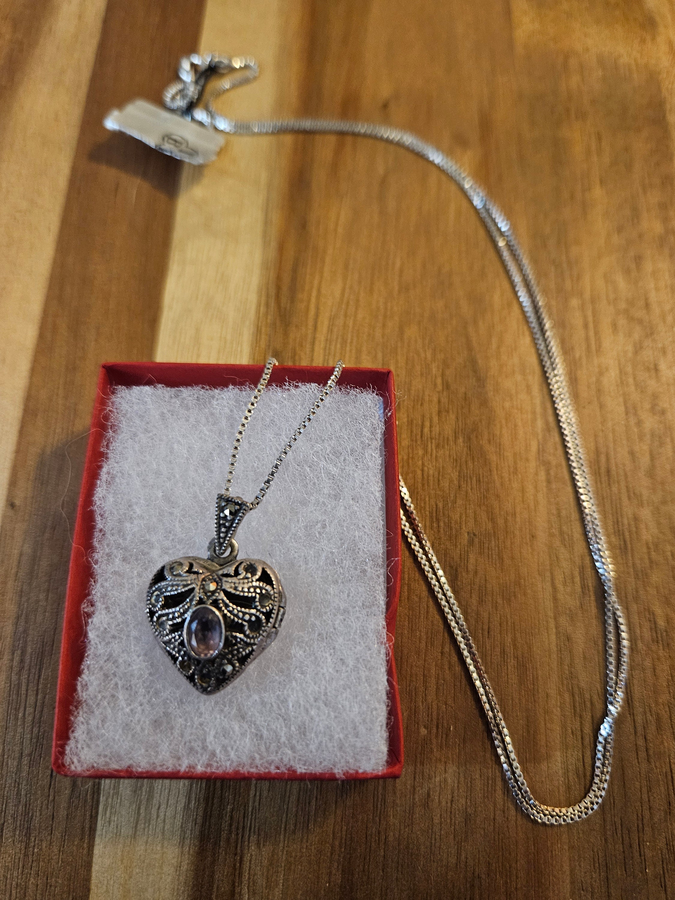 Very beautiful marcasite vintage sterling silver heart locket with an amethyst stone on a long nwt sterling silver chain.