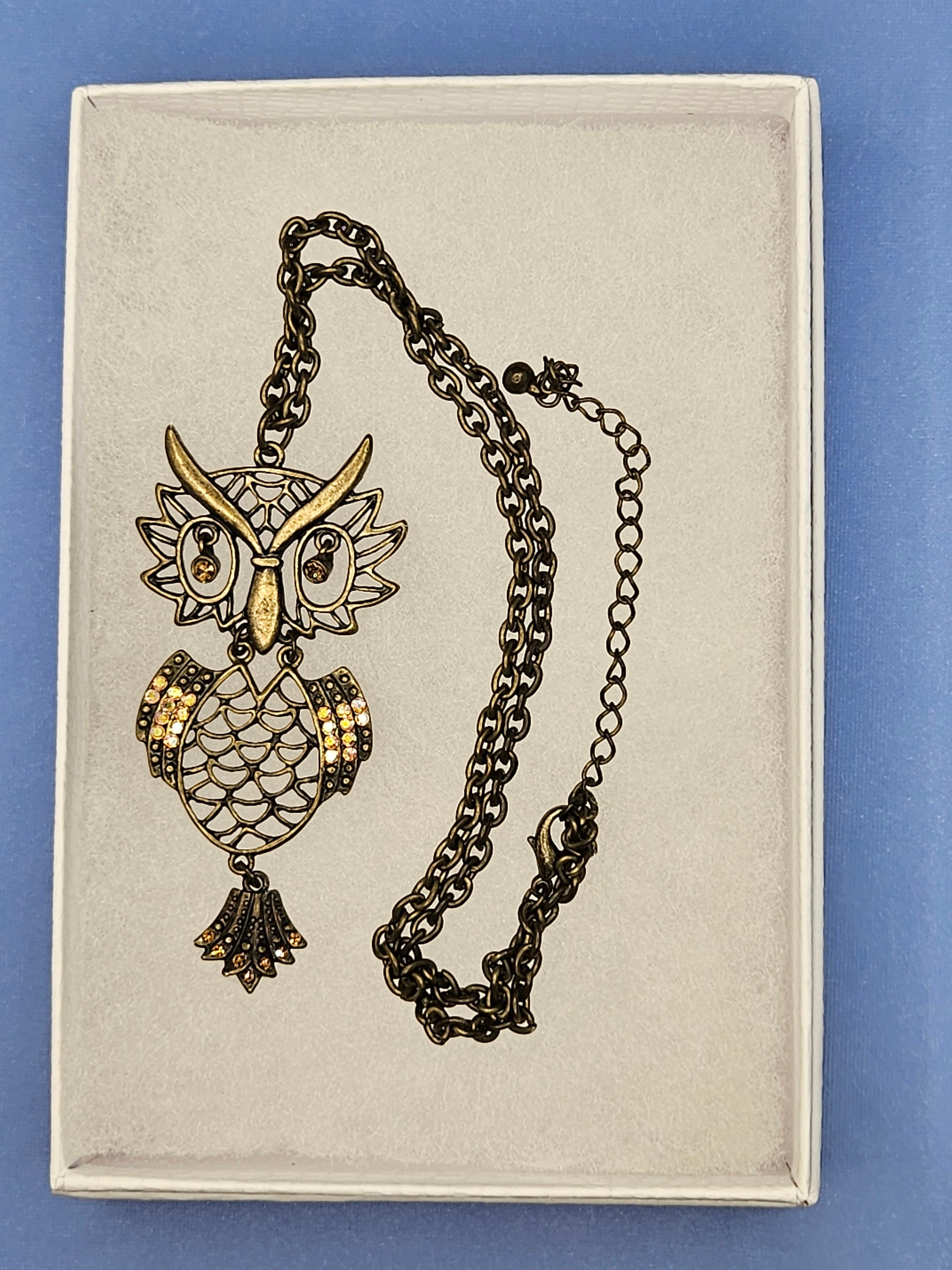 Large hooting vintage owl necklace with dangle eyes and crystals.