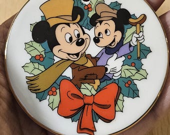 Vintage Disney Ceramic ornament of Mickey Mouse and Tiny tim.  Large ornament close to 3 inches.