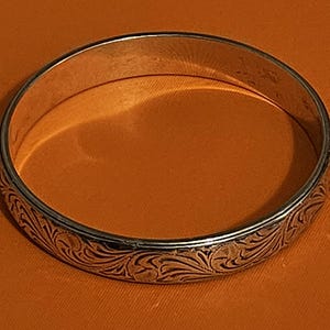 May include: A rustic wooden sign with the text "Welcome to our home" in white lettering. The sign features a distressed finish and a simple, inviting design, perfect for entryway decor.