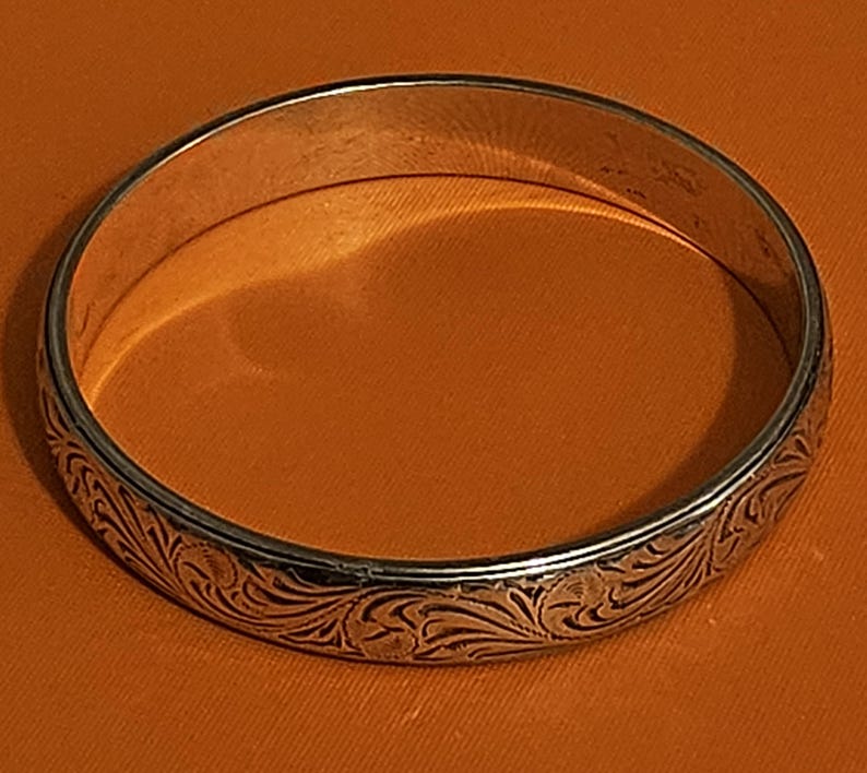 May include: A rustic wooden sign with the text "Welcome to our home" in white lettering. The sign features a distressed finish and a simple, inviting design, perfect for entryway decor.