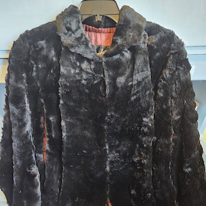 Marvelous vintage black short fur cape by Schumacher of Portland Oregon in excellent vintage condition!