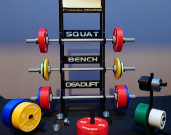 Personal Records display avec Cage et Rack en plus des barres et poids type Rogue IWF