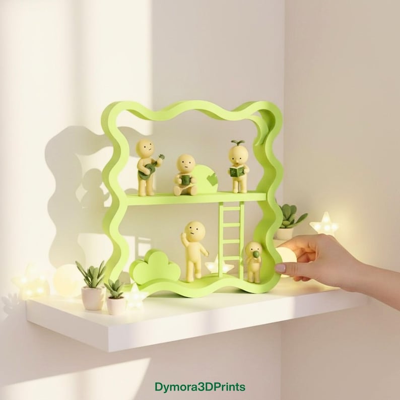 May include: A light green decorative shelf with a wavy design, holding small yellow figurines. The figurines are engaged in various activities, such as playing a guitar and reading. The shelf is on a white surface, with small plants and lights.