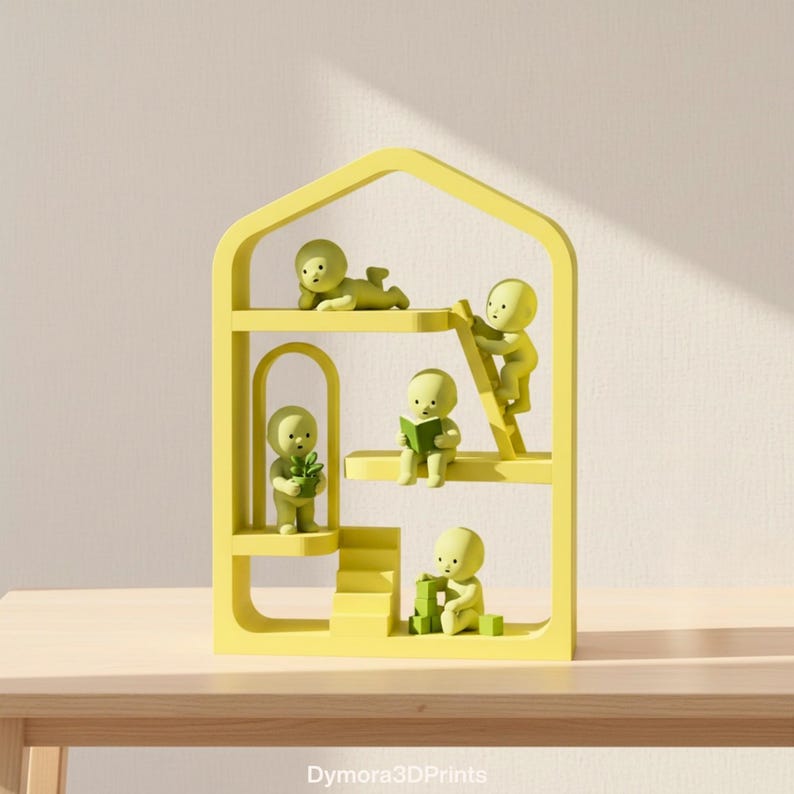 May include: A yellow, house-shaped shelf unit with five small, green figures in various poses. One figure is lying down, another is climbing a ladder, one is reading a book, one is holding a plant, and the last is building with blocks.