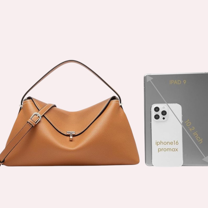 May include: A tan leather handbag with a top handle and a shoulder strap. The bag has a silver-colored clasp and buckle. An iPad 9 and an iPhone 16 Pro Max are next to the bag. The iPad is 10.2 inches.