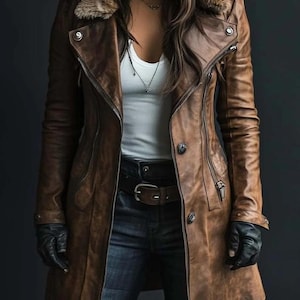 May include: A brown leather coat with a fur collar, a zipper closure, and button details. The coat is worn with a white top, blue jeans, a brown belt, and black gloves. The coat has a classic, rugged style.