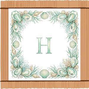 May include: Square watercolor design featuring a sea-themed border with oysters, seashells, and seaweed in shades of green, beige, and white. The letter "H" is in the center. The design is framed by a wooden border.