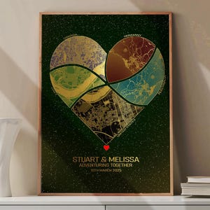 May include: A framed print featuring a heart-shaped design composed of map segments from Canada, Germany, Australia, and the United States. The print includes the names "STUART & MELISSA" and the text "ADVENTURING TOGETHER 10TH MARCH 2025".