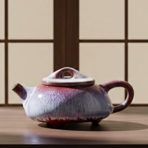 May include: A ceramic teapot with a lid, spout, and handle. The teapot is primarily white with a gradient of purple and red hues. It sits on a wooden surface in front of a window with a grid pattern.