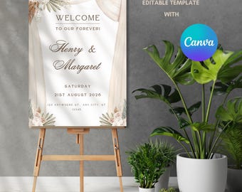 May include: A wooden easel displays a welcome sign for a wedding. The sign features text that reads "WELCOME TO OUR FOREVER! Henry & Margaret SATURDAY 21ST AUGUST 2020". The sign has floral and curtain-like design elements. The Canva logo is visible.