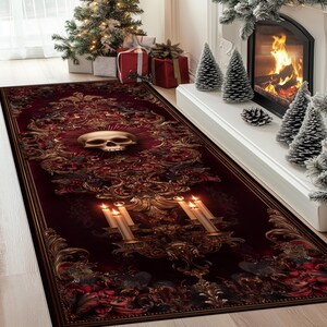 May include: A rectangular, burgundy-colored rug with a skull and ornate gold filigree design. The rug features a central skull motif, candle holders, and a decorative border. The rug is placed in front of a fireplace and Christmas tree.
