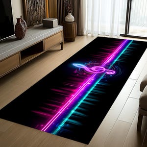 May include: A rectangular black rug with a musical theme. It features a neon-style treble clef and piano keys design in shades of pink, blue, and purple. The rug is placed on a wooden floor.