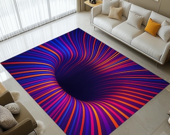 May include: A rectangular area rug with a 3D optical illusion design. The rug features a dark blue center that appears to be a hole, surrounded by vibrant lines of orange, pink, and blue, creating a swirling effect.