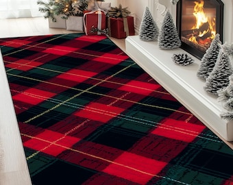 May include: A rectangular red, black, and green plaid rug. The rug has a diagonal pattern with intersecting lines of yellow. The rug is placed in front of a fireplace and Christmas tree.