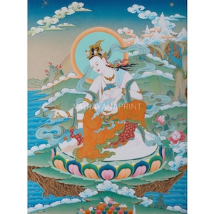 May include: A colourful painting depicting a deity seated on a lotus flower, with a halo and mountainous scenery. The figure wears a crown and orange and white robes. The background features a blue sky and water, with the text "Vajrayana Print".