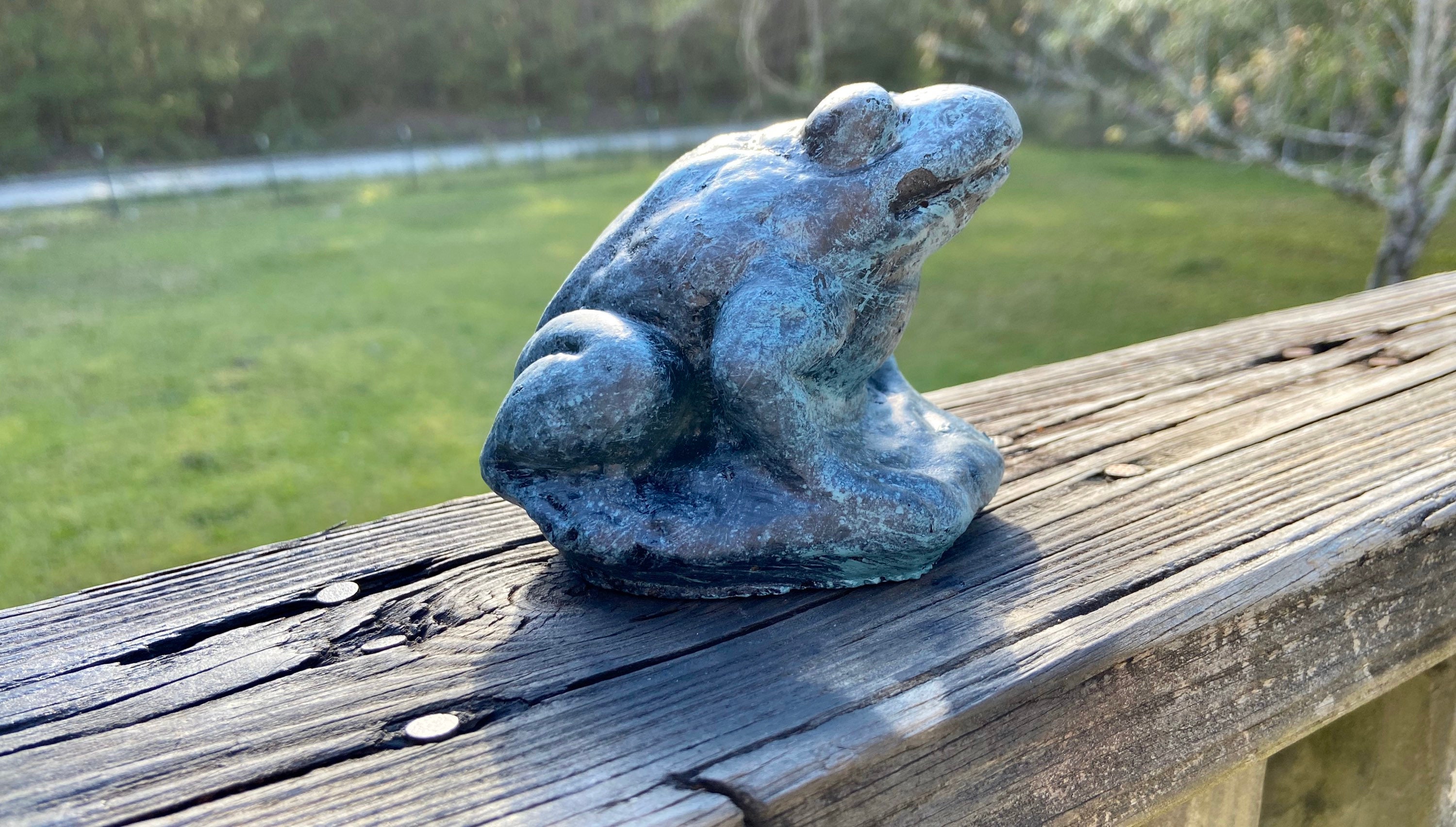 concrete frog statue