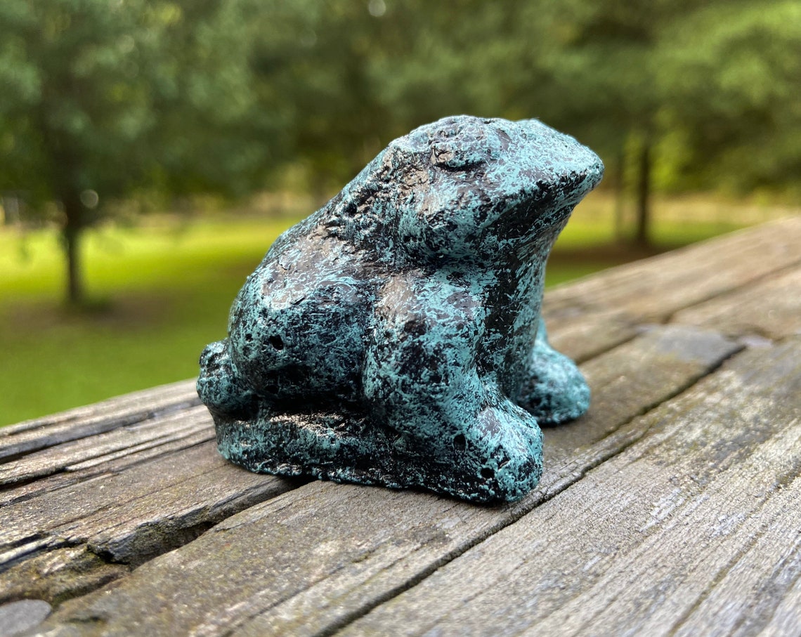 concrete frog statue