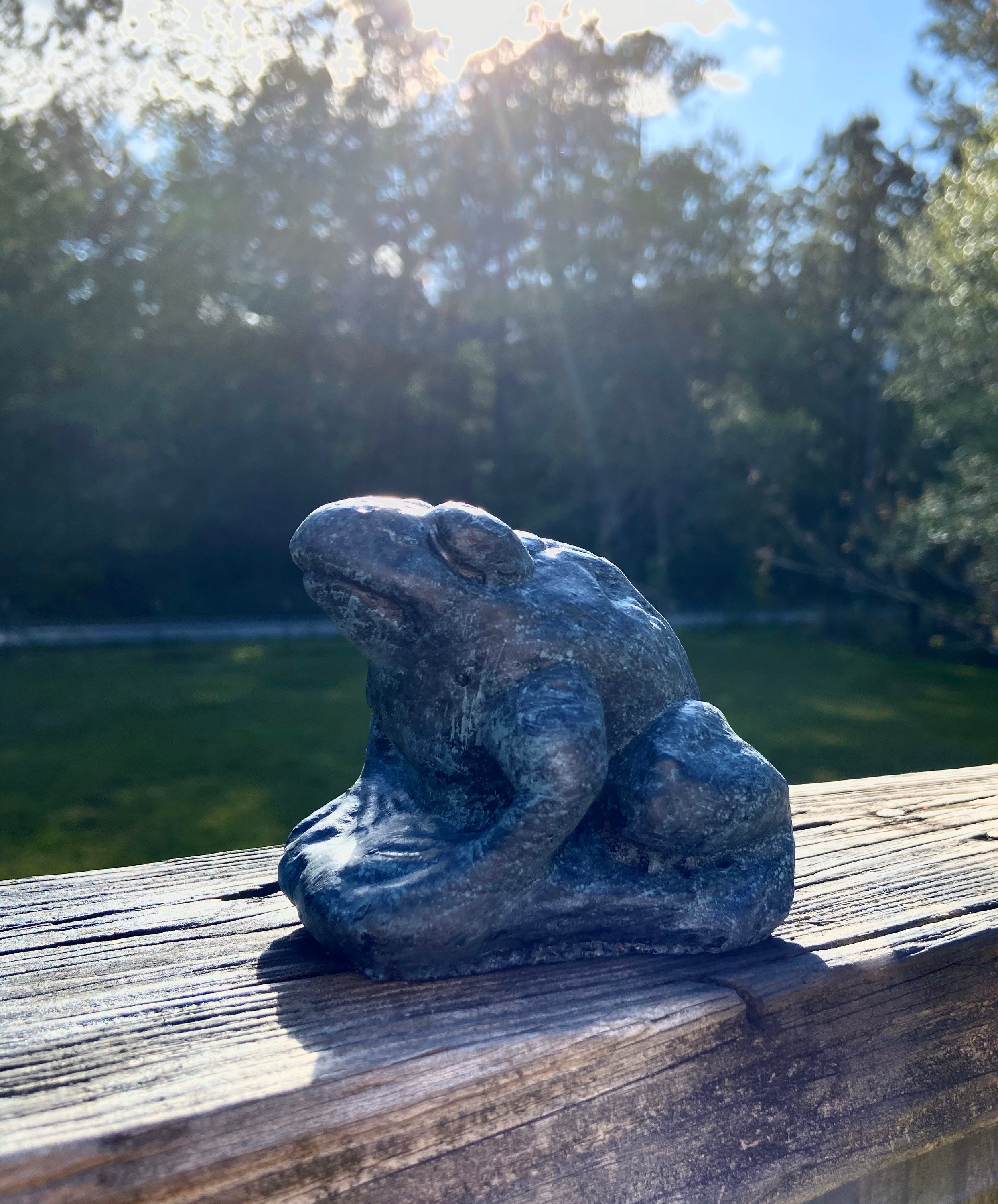 concrete frog statue