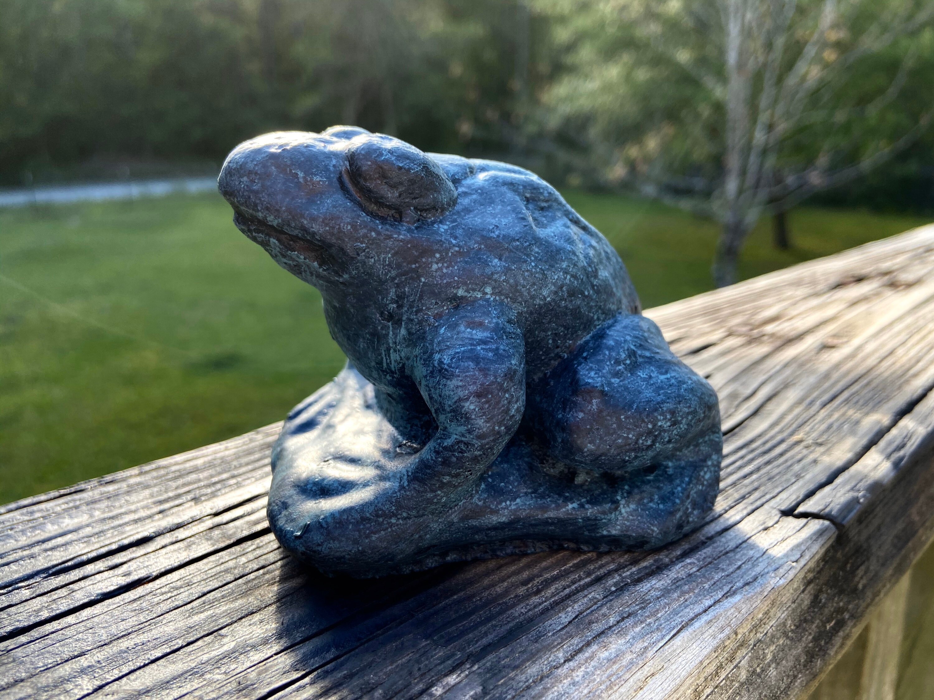 concrete frog statue