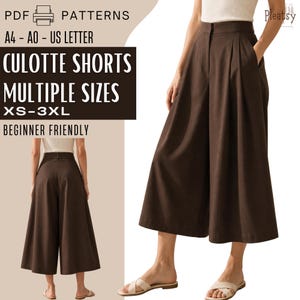 May include: A digital sewing pattern for dark brown culotte shorts with a high waist and wide legs. The text reads: PDF PATTERNS, A4 - A0 - US LETTER, CULOTTE SHORTS, MULTIPLE SIZES, XS-3XL, BEGINNER FRIENDLY, Pleatsy. The shorts are shown from front and back.
