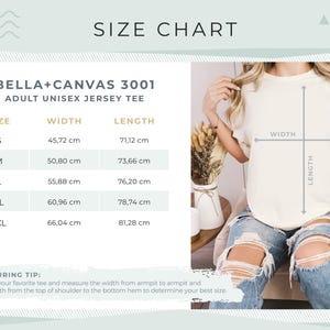 May include: A size chart for an adult unisex jersey tee, with measurements in centimeters. The chart includes sizes S, M, L, XL, and 2XL, with corresponding width and length measurements. A person is wearing the tee, with width and length indicators.