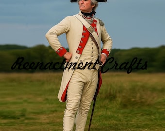 May include: Cream-colored historical military uniform with red accents, including a long coat, pants, and a tricorn hat. The uniform features gold buttons and trim, and is worn with a black necktie and a brown leather strap. The text "Reenactment Crafts" is visible.