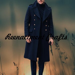 May include: A navy blue double-breasted coat with gold buttons. The long coat has a notched collar and a tailored fit. The text "Reenactment Crafts" is written in cursive on the lower left side of the image.