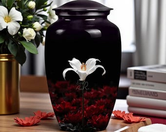 Elegante urna commemorativa floreale con giglio bianco e fiori rossi, simbolo di purezza, amore, forza e omaggio eterno, scatola per ceneri, scatola per urna per animali domestici