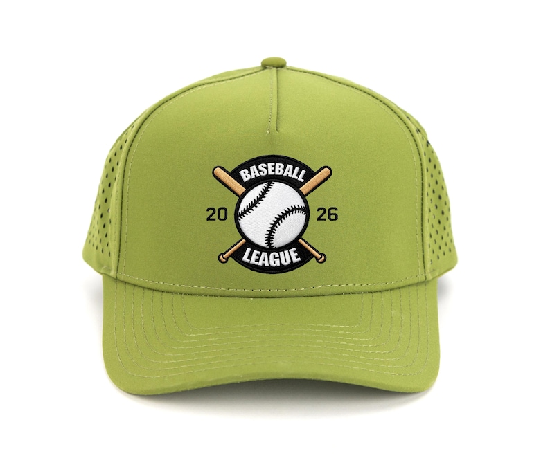 May include: A light green baseball cap with a curved brim and mesh side panels. The cap features a baseball league logo with a baseball and crossed bats, and the text "BASEBALL LEAGUE 20 26".