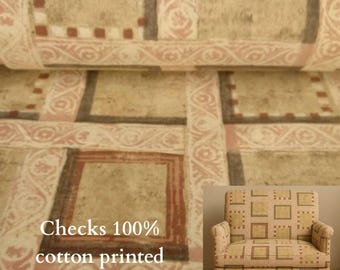 May include: Cream-colored upholstery fabric with a repeating pattern of squares and rectangles in shades of brown and pink. The fabric is 100% cotton and printed. A matching armchair is shown in the corner.