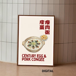 May include: A framed print with a watercolour illustration of Century Egg & Pork Congee. The image shows a bowl of congee with black eggs and a side of fried dough. The text "CENTURY EGG & PORK CONGEE" is below the bowl, with Chinese characters above.