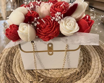 Ramo de flores en velas rojas/blancas