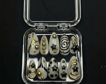 Uñas postizas con estrellas doradas y negras – Juego de uñas con efecto almendra 3D cromado Y2K Celestial Long Almond