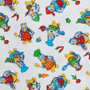 May include: White fabric with a repeating pattern of cartoon penguins in chef attire. The penguins are in various poses, holding cooking utensils and surrounded by vegetables like carrots, radishes, and chili peppers. The penguins wear aprons and chef hats.