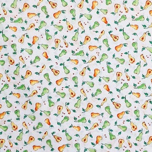May include: White fabric with a repeating pattern of green and orange pears, small red dots, and green leaves. The pears are in various orientations, creating a lively and fresh design. This fabric is suitable for various sewing projects.