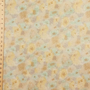 May include: A beige fabric with a floral pattern in shades of brown, yellow, and green. The fabric has a textured, crinkled look.
