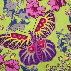 May include: A vibrant green fabric with a repeating pattern of purple, pink, yellow, and gray butterflies and flowers. The butterflies have intricate details and are set against a bright green background.