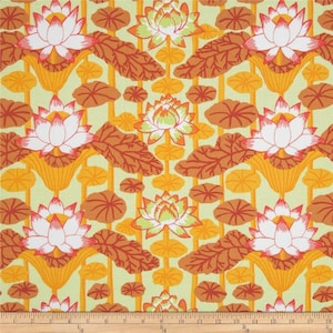 May include: A repeating pattern of white and pink lotus flowers with green centers on a yellow background. The flowers are surrounded by brown leaves and stems.