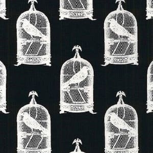 May include: A black and white repeating pattern of birdcages with birds inside. The birdcages are ornate and have a detailed design. The birds are stylized and have a simple design.