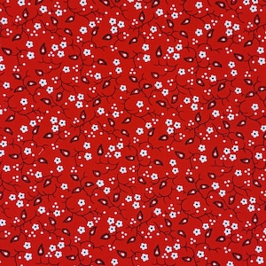 Puede incluir: Primer plano de una tela roja con un estampado floral repetido. Pequeñas flores y puntos blancos están dispersos por la superficie. Las vides y hojas de color marrón oscuro componen el diseño.