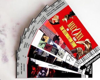 May include: A fan of Madonna? A stack of concert tickets for "The Celebration Tour" is fanned out. The tickets have a red background with the tour name and images of Madonna. The tickets also include venue and date information.