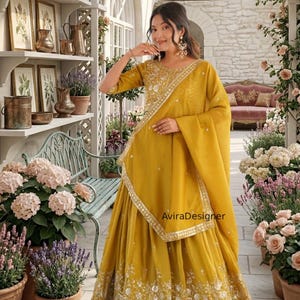 May include: A rustic wooden sign with the text "Welcome" in a handwritten style. The sign is painted white with a distressed finish, and features a decorative floral element in the corner. The background is a blurred image of a home.