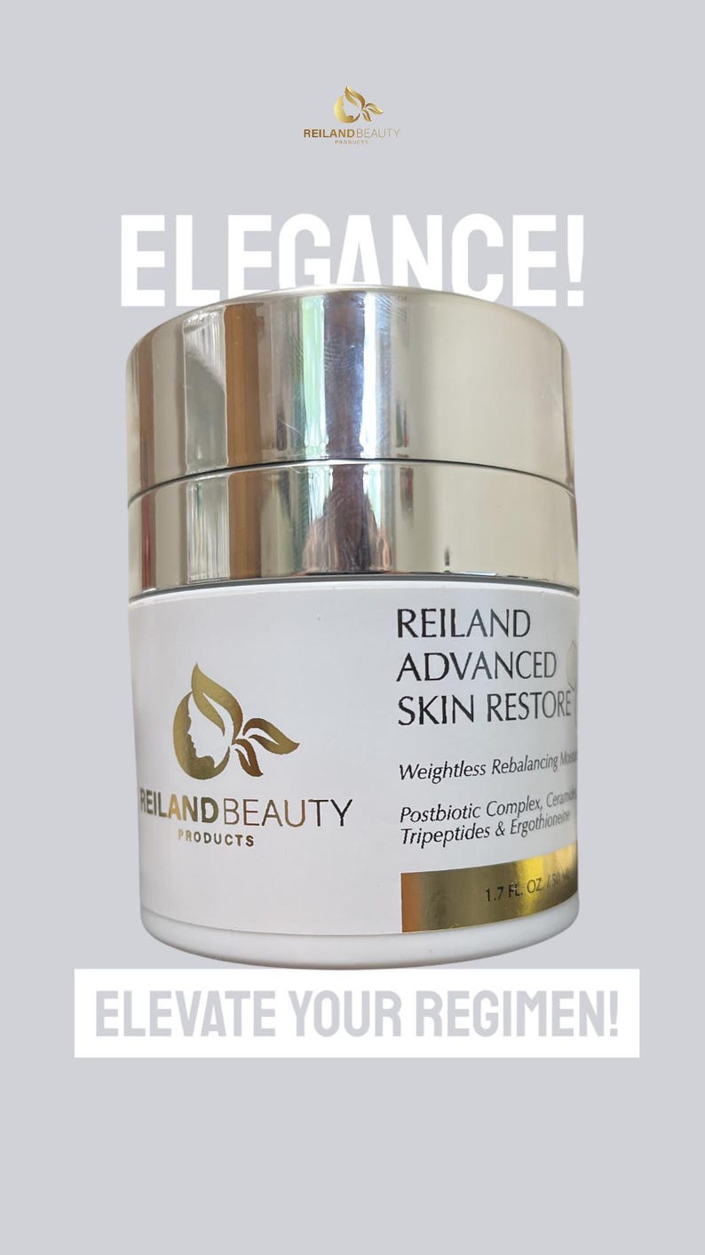 May include: A white and gold jar of Reiland Advanced Skin Restore cream. The jar has a silver lid and the text "ELEGANCE!" and "ELEVATE YOUR REGIMEN!" are displayed above and below the jar. The jar contains 1.7 fl oz.