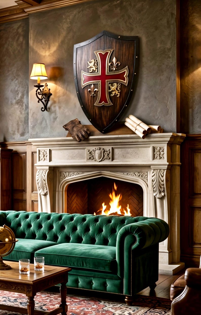 May include: A dark wood shield with a red cross, gold lion, and fleur-de-lis emblems mounted above a stone fireplace. The shield features a dark border with metal rivets. A pair of leather gloves and rolled parchment scrolls rest on the mantel.